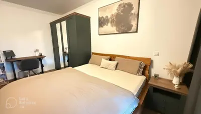Ein Bett oder Betten in einem Zimmer der Unterkunft Accommodation at a prime location - near messe