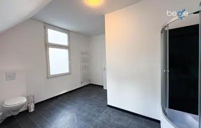 Ein Badezimmer in der Unterkunft BEGE APARTMENTS WorkSuite