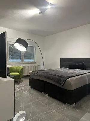Ein Bett oder Betten in einem Zimmer der Unterkunft Messe Apartment - Near Trade Fair