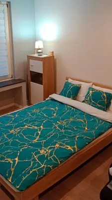 Ein Bett oder Betten in einem Zimmer der Unterkunft Nastaran Nest