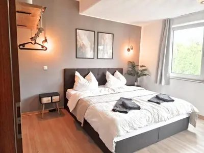 Ein Bett oder Betten in einem Zimmer der Unterkunft Barrier-Free Studio Near Messe