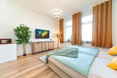 Ein Bett oder Betten in einem Zimmer der Unterkunft Perfect for 6 Guests in Wuppertal - Suite - Netflix - Smart Home
