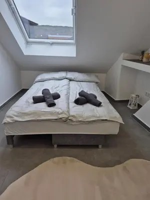 Ein Bett oder Betten in einem Zimmer der Unterkunft MG Studio