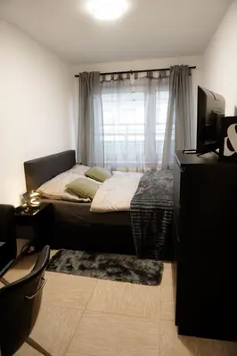 Ein Bett oder Betten in einem Zimmer der Unterkunft M House Do - Cozy Room - ideal für 1 Person