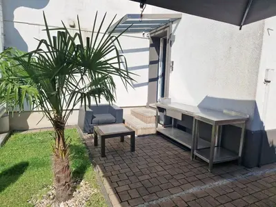 Ein Garten an der Unterkunft Bei Pina - Business apartment nahe Düsseldorf
