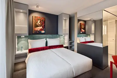Ein Bett oder Betten in einem Zimmer der Unterkunft Essential by Dorint Düsseldorf Deiker Höfe