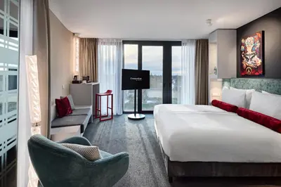 Ein Bett oder Betten in einem Zimmer der Unterkunft Essential by Dorint Düsseldorf Deiker Höfe