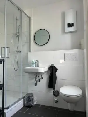 Ein Badezimmer in der Unterkunft SleepInn Recklinghausen