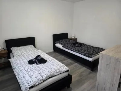 Ein Bett oder Betten in einem Zimmer der Unterkunft Altes Sägewerk 3