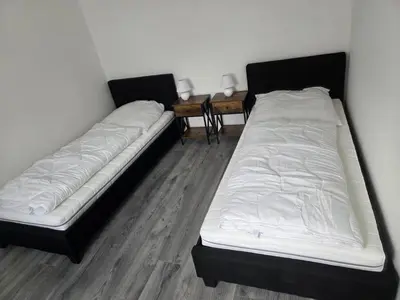 Ein Bett oder Betten in einem Zimmer der Unterkunft Altes Sägewerk 3