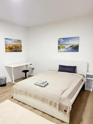 Ein Bett oder Betten in einem Zimmer der Unterkunft City-Apartment - zentral mit schöner Terrasse
