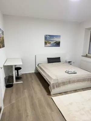 Ein Bett oder Betten in einem Zimmer der Unterkunft City-Apartment - zentral mit schöner Terrasse