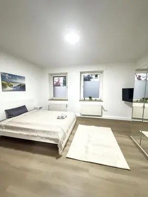 Ein Bett oder Betten in einem Zimmer der Unterkunft City-Apartment - zentral mit schöner Terrasse