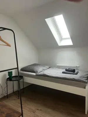 Ein Bett oder Betten in einem Zimmer der Unterkunft CityNest Recklinghausen