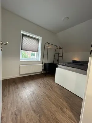 Ein Bett oder Betten in einem Zimmer der Unterkunft CityNest Recklinghausen
