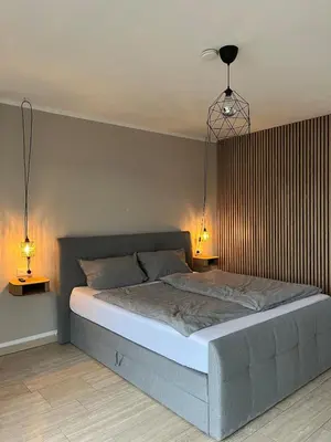 Ein Bett oder Betten in einem Zimmer der Unterkunft Cozy apartment