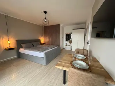 Ein Bett oder Betten in einem Zimmer der Unterkunft Cozy apartment