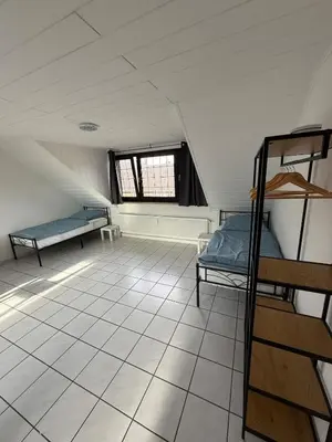 Ein Bett oder Betten in einem Zimmer der Unterkunft Apartment Wesel