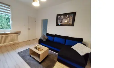 Ein Sitzbereich in der Unterkunft Charmantes Haus-im-Haus Apartment mit eigenem Hauseingang