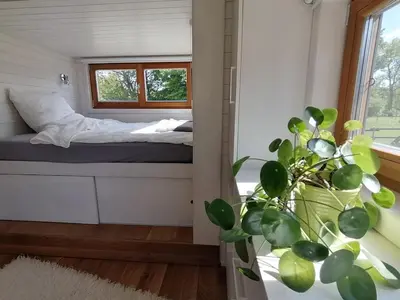 Ein Bett oder Betten in einem Zimmer der Unterkunft Tiny house with view of nature