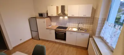 Küche/Küchenzeile in der Unterkunft Charmante, ruhige Erdgeschosswohnung mit Balkon