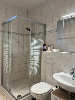 Ein Badezimmer in der Unterkunft Charmante, ruhige Erdgeschosswohnung mit Balkon