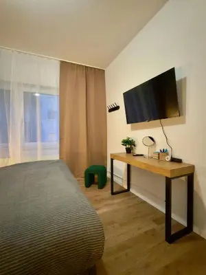 TV/Unterhaltungsangebot in der Unterkunft Stylish City Apartment mit Beamer & Balkon Zentral