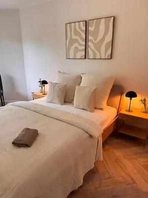 Ein Bett oder Betten in einem Zimmer der Unterkunft Cozy Apartment Beethoven mit Balkon