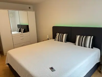 Ein Bett oder Betten in einem Zimmer der Unterkunft WohlfühlQuartier Hückeswagen