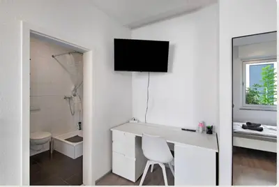 Ein Badezimmer in der Unterkunft StayBaran City Apartment Bochum