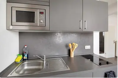 Küche/Küchenzeile in der Unterkunft StayBaran City Apartment Bochum