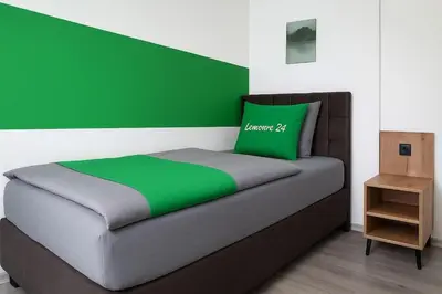 Ein Bett oder Betten in einem Zimmer der Unterkunft Livemore24 Apartment 1 in Herten 24-7 Check-In