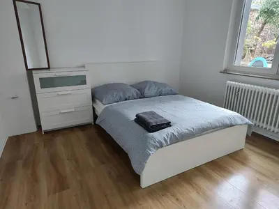 Ein Bett oder Betten in einem Zimmer der Unterkunft LivingStation Essen R1 bis R4