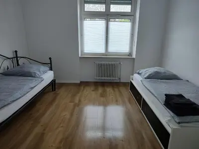 Ein Bett oder Betten in einem Zimmer der Unterkunft LivingStation Essen R1 bis R4