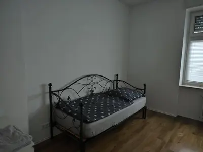 Ein Bett oder Betten in einem Zimmer der Unterkunft LivingStation Essen R1 bis R4