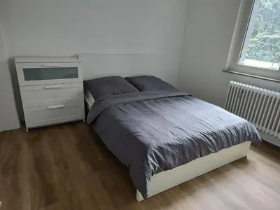 Ein Bett oder Betten in einem Zimmer der Unterkunft LivingStation Essen R1 bis R4