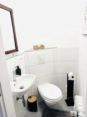 Ein Badezimmer in der Unterkunft MOLA Apartments - Panoramablick, Balkon, 5 Pers, Bahnhofsnähe, Parkplatz