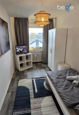 Ein Bett oder Betten in einem Zimmer der Unterkunft BEGE APARTMENTS WorkHaus