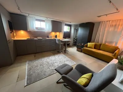 Ein Sitzbereich in der Unterkunft Appartement am Rüsberg