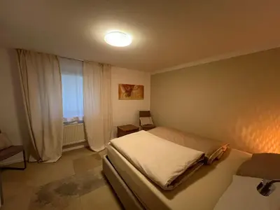 Ein Bett oder Betten in einem Zimmer der Unterkunft Appartement am Rüsberg