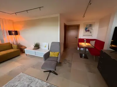 Ein Sitzbereich in der Unterkunft Appartement am Rüsberg
