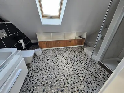 Grundriss der Unterkunft Stylish top floor apartment with garden view