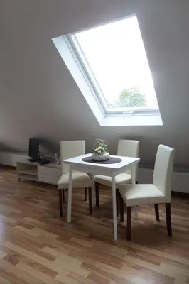 Ein Sitzbereich in der Unterkunft Flughafenapartement Sky View