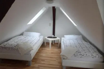 Ein Bett oder Betten in einem Zimmer der Unterkunft Flughafenapartement Sky View