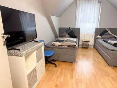 TV/Unterhaltungsangebot in der Unterkunft Ruhr Business Apartments Essen Apartment mit 7 Einzelbetten