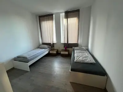 Ein Bett oder Betten in einem Zimmer der Unterkunft Monteurwohnung Remscheid