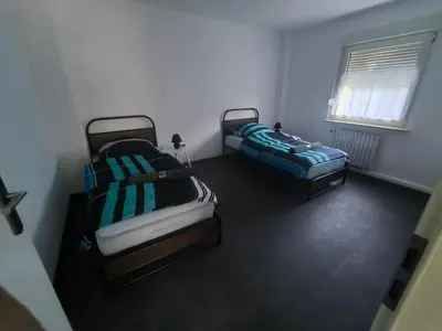 Ein Bett oder Betten in einem Zimmer der Unterkunft Mego Unterkünfte 2