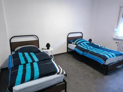 Ein Bett oder Betten in einem Zimmer der Unterkunft Mego Unterkünfte 2
