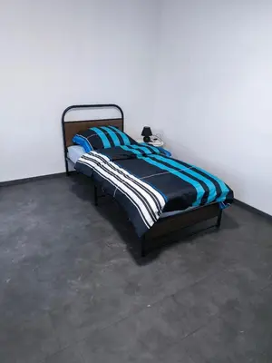 Ein Bett oder Betten in einem Zimmer der Unterkunft Mego Unterkünfte 2