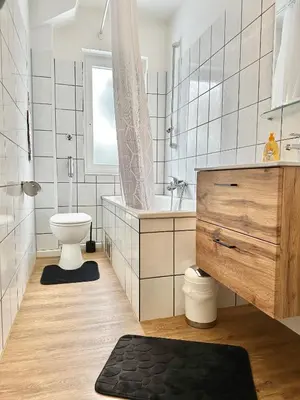 Ein Badezimmer in der Unterkunft VAJAGIC 2 - Apartment 5 Pers, 2 Schlafzimmer, Messe, Uni Klinik